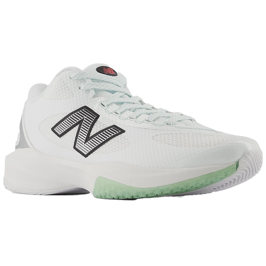 The New Balance FreezeLX 5 Box Shoes are a white athletic shoe with a sleek and modern design, showcasing a black "N" logo on the side. Featuring a breathable mesh upper and a slightly elevated sole accented in light green, they offer multi-surface traction, making them perfect for box lacrosse.