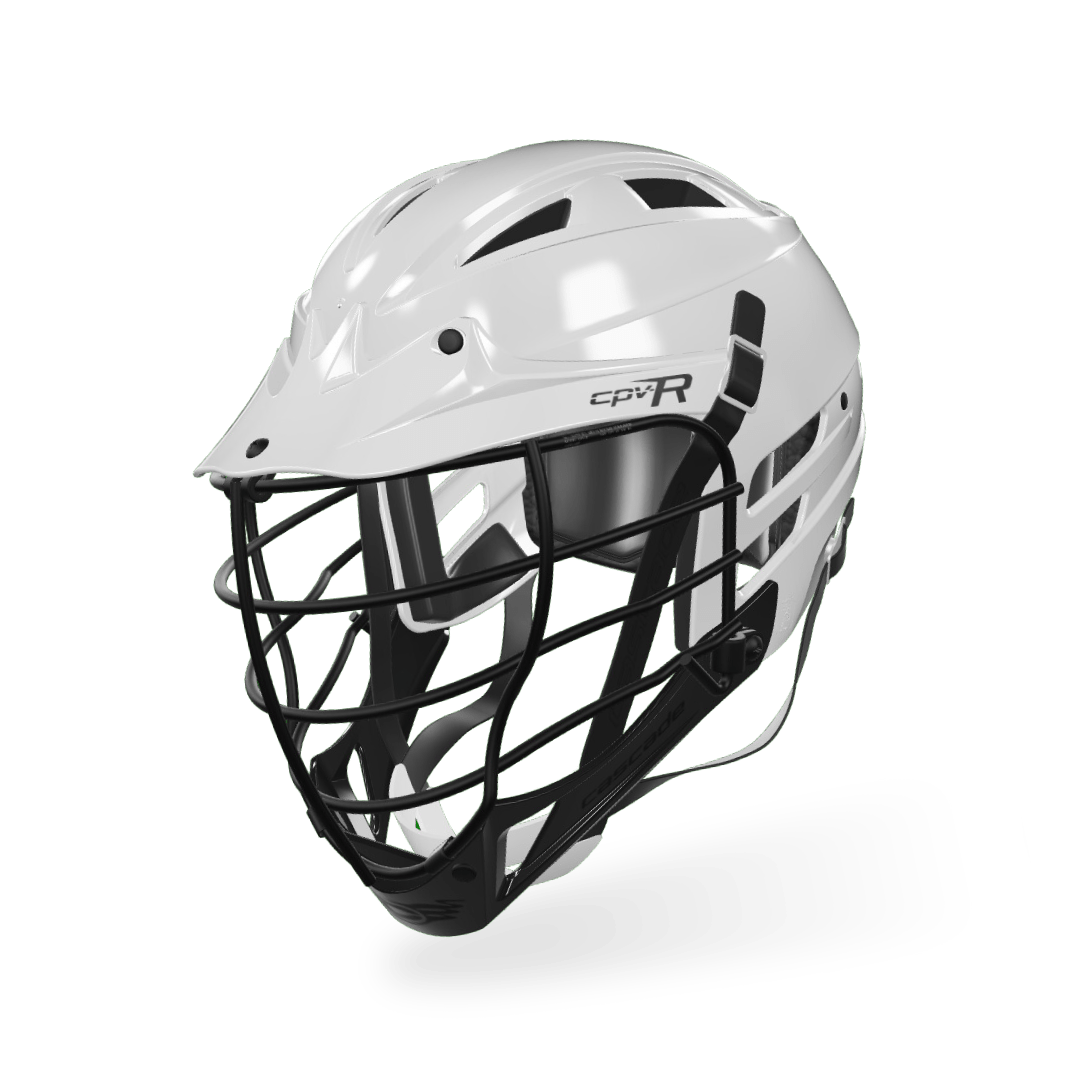 A Cascade Beginner Lacrosse Helmet CPV-R in white, featuring a black face guard and the "CPV-R" logo on the side. This Cascade helmet has multiple air vents for ventilation and includes a chin strap for secure fitting, designed to provide protection for advancing youth players during games.