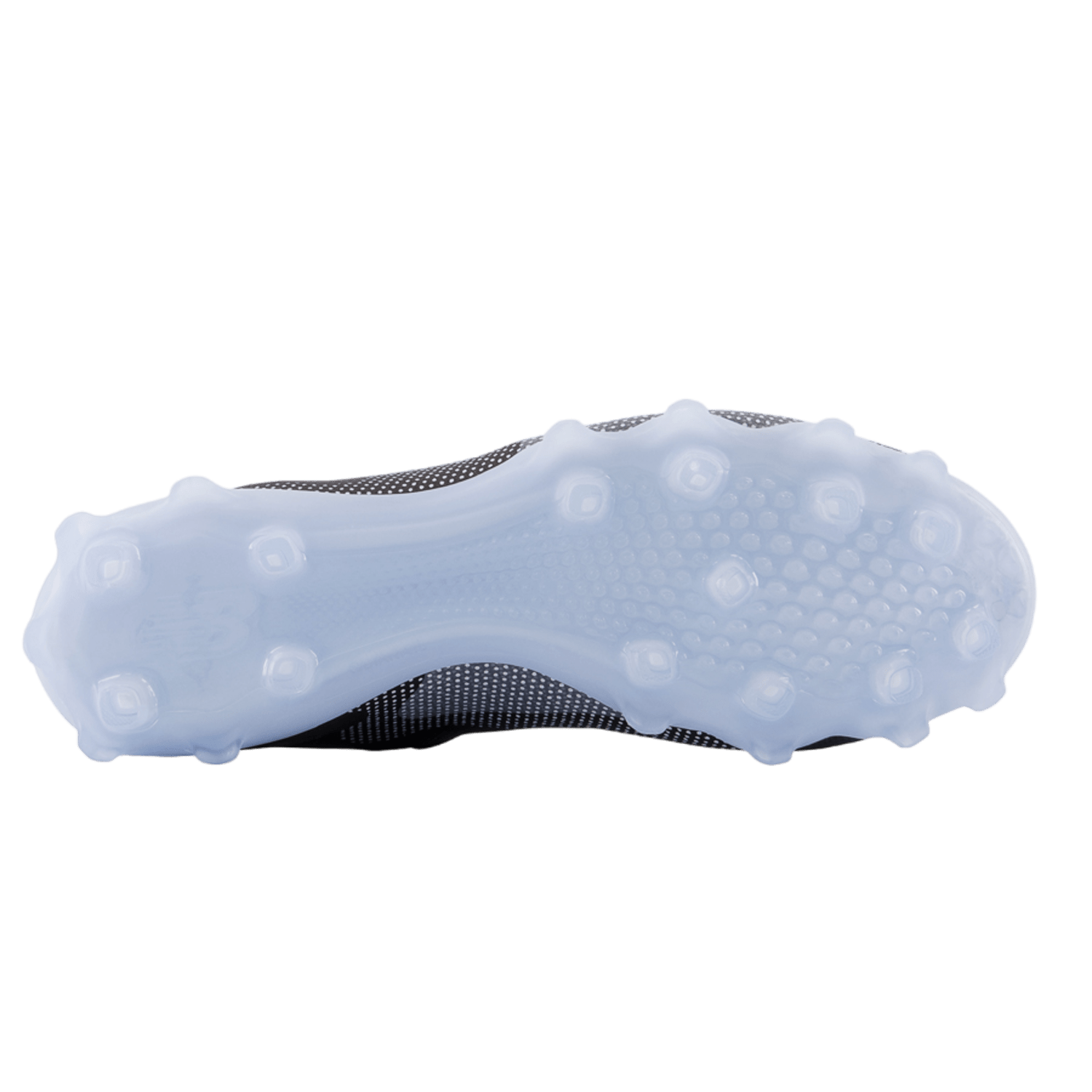 The image displays the underside of a soccer cleat with a translucent QUIX outsole, showcasing studs of different sizes for optimal grip on the field. The upper part is dark, and its sleek, contemporary design resembles that of the New Balance Freeze LX 4 Low Cleats in Black.